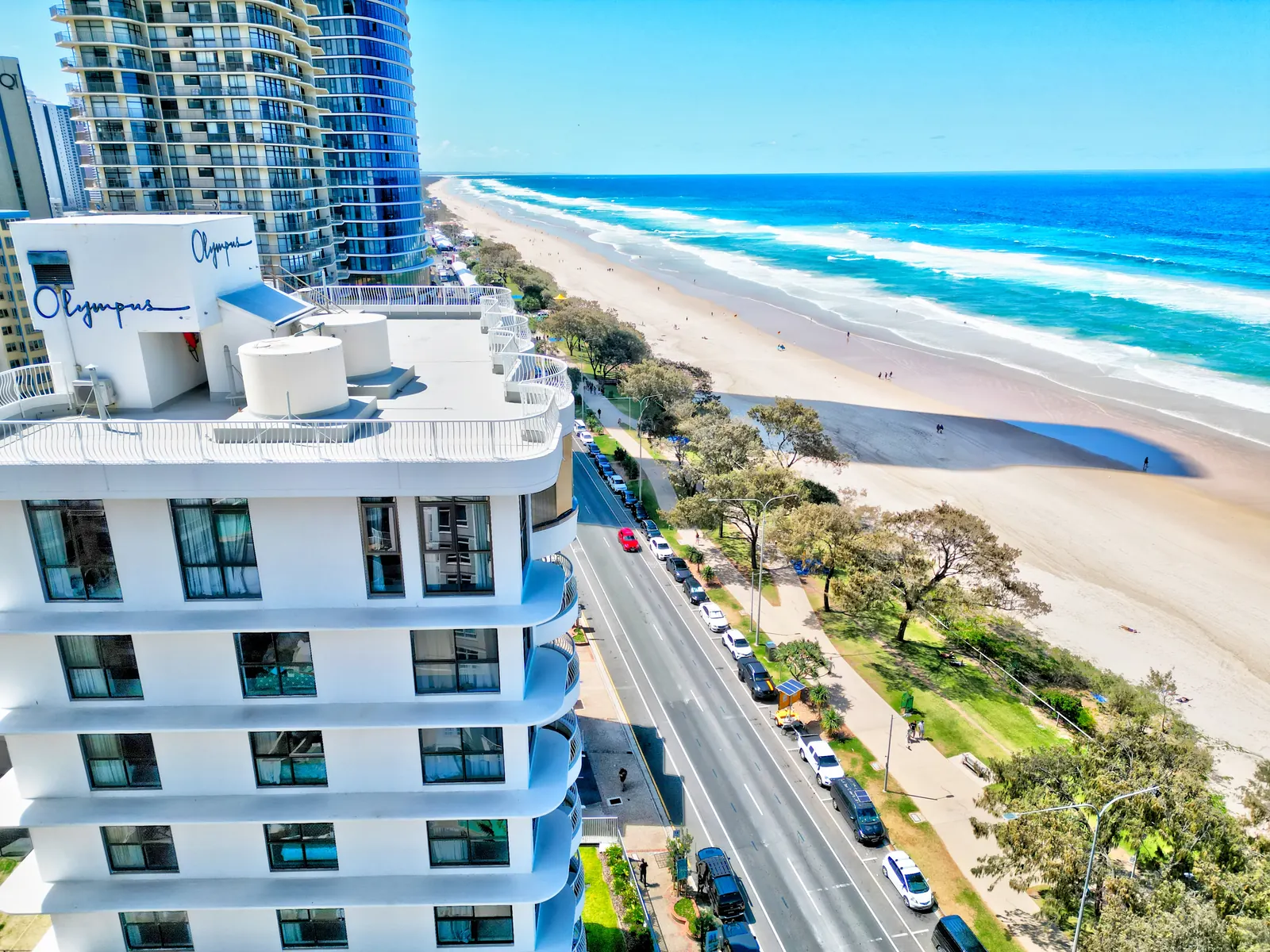 Aerial view of the Olympus building on The Esplanade beside Surfers Paradise beach