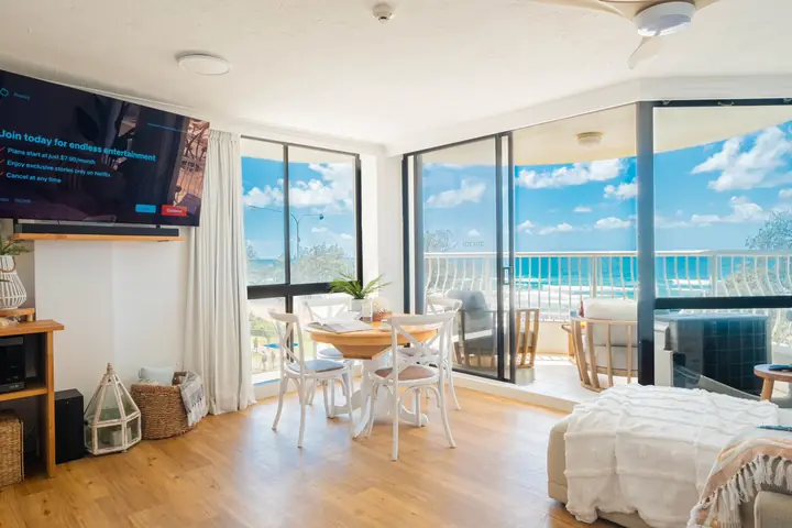 Open-plan living, dining and ocean views