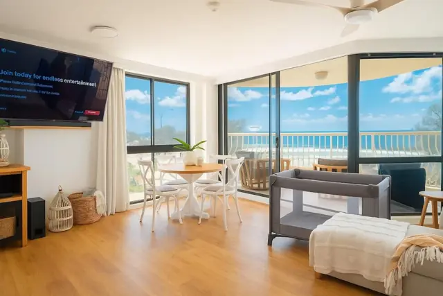 Living area, shown with the travel cot set up